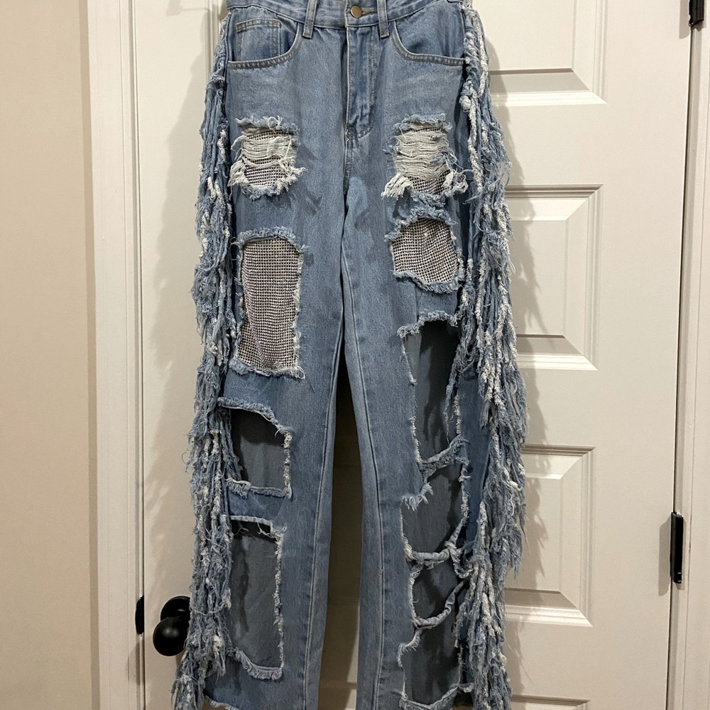 Distressed denim jeans